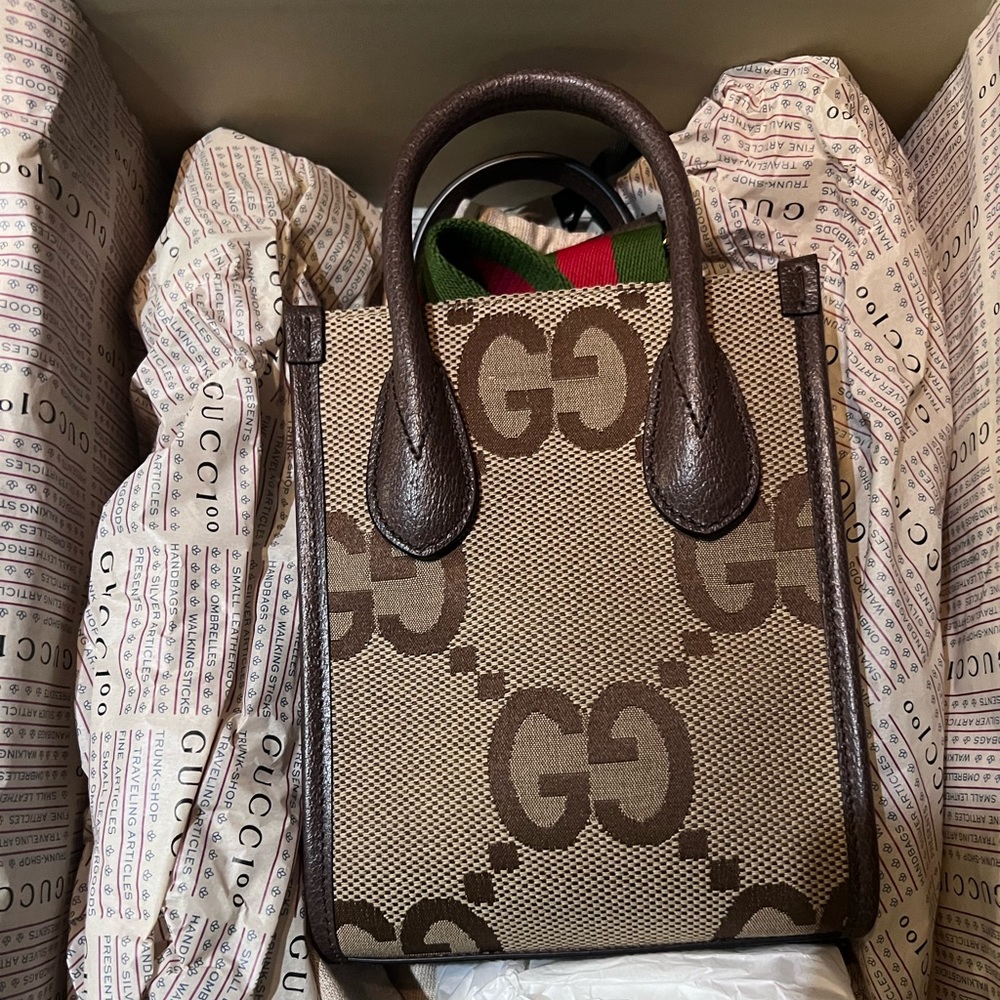 GUCCI Jumbo GG mini tote bag with strap.